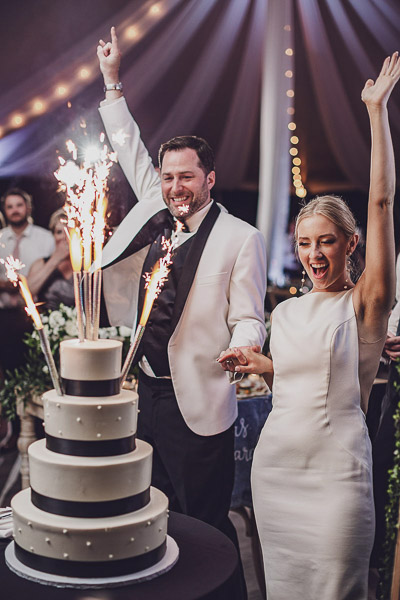 bride groom cake cutting sparklers