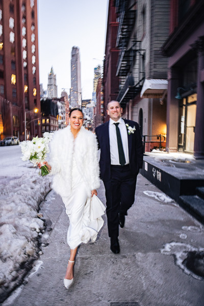 couple walking down street 1